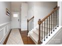 Bright and spacious entryway with hardwood floors and staircase at 5063 Gribble Ln, Lancaster, SC 29720