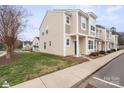 Inviting townhome exterior with well-maintained lawn and sidewalk; a desirable community setting at 528 Fawnborough Ct, Rock Hill, SC 29732