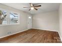 Bright living room featuring luxury vinyl plank flooring, fresh paint, and natural light at 901 Wyke Rd, Shelby, NC 28150