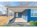 Covered porch with concrete flooring and access to the home at 1127 Ansonville Rd, Wingate, NC 28174