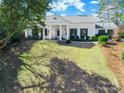 Stunning aerial view of a white home with lush green landscaping at 1139 Hermitage Rd, Rock Hill, SC 29732