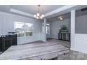 Elegant dining room featuring hardwood floors and a large table at 170 Swann Rd, Statesville, NC 28265