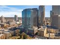 Scenic aerial view of a high-rise building with stunning architectural detail in a vibrant cityscape at 210 N Church St # 2411, Charlotte, NC 28202