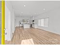 Bright, open-concept living space featuring hardwood floors and natural light at 2100 St Paul St, Charlotte, NC 28216