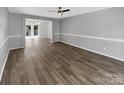 Bright living room with hardwood floors and an open floor plan at 2139 Mallard Green Pl, Charlotte, NC 28262