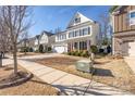 Traditional home showcasing a manicured lawn and inviting curb appeal at 223 Blossom Ridge Dr # 137, Mooresville, NC 28117