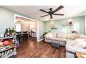 Inviting living room with hardwood floors, a ceiling fan, and an open view into the dining area at 2745 33Rd Ne Ave, Hickory, NC 28601