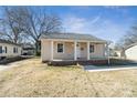 Charming home featuring a covered front porch with columns and brick accents at 505 Kings Mountain St, Clover, SC 29710