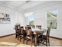 Spacious dining room with hardwood floors and a large rectangular table at 523 Rock Skip Way, Fort Mill, SC 29708