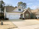 Beautiful house with a manicured front lawn and a convenient two-car garage at 577 Rustlewood Way, Rock Hill, SC 29732