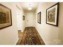 Welcoming entryway featuring beautiful floors and neutral paint with decorative wall art at 577 Rustlewood Way, Rock Hill, SC 29732