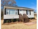 Newly renovated ranch home with a charming front porch at 624 Windy Hill Dr, Gastonia, NC 28052