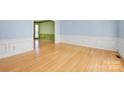 Dining room with light blue walls and bamboo flooring at 12822 Angel Oak Dr, Huntersville, NC 28078