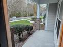 View from the porch showcases a quiet residential street at 14955 Alexander Place Dr, Huntersville, NC 28078