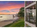 Stunning waterfront view with private beach access from the luxury condo's balcony at 17811 Half Moon Ln # E, Cornelius, NC 28031