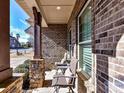 Inviting covered front porch with seating provides a relaxing outdoor space at 2001 Arbor Hills Dr, Indian Trail, NC 28079