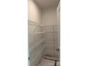 Walk-in pantry with ample shelving for organized storage at 4122 Eastover Glen Rd # 0316, Charlotte, NC 28269