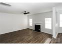 Living room with hardwood floors, fireplace, and ceiling fan at 675 Winding Branch Rd, Rock Hill, SC 29732