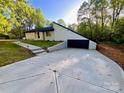 Charming single-story home with white paint and black trim at 108 Vance Allen Ave, Rockwell, NC 28138