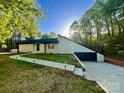 Charming single-story home with white paint and black trim at 108 Vance Allen Ave, Rockwell, NC 28138