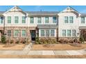 Two story townhome with stone and siding exterior at 1412 Galloway Rd, Charlotte, NC 28262