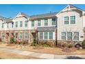 Beautiful two-story townhome with stone and siding exterior at 1412 Galloway Rd, Charlotte, NC 28262