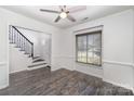 Bright dining room with hardwood floors and ceiling fan at 3316 Brooktree Ln, Indian Trail, NC 28079