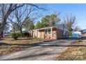 Ranch home with a long driveway at 3721 Braden Dr, Charlotte, NC 28216