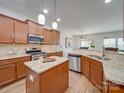 Modern kitchen with granite countertops, stainless steel appliances, and an island at 6029 Landry Ln, Indian Land, SC 29707