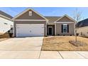 Newly built home with 2-car garage and well-manicured lawn at 7192 Indigo Way, Denver, NC 28037