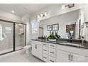 Double vanity bathroom with a large walk-in shower at 2320 Donnelly Hills Ln, Charlotte, NC 28262