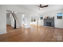Bright living room with hardwood floors, fireplace, and lots of natural light at 49 8Th Se St, Hickory, NC 28602