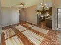 Bright dining area with hardwood floors and view to backyard at 257 Doughton Ln, Charlotte, NC 28217