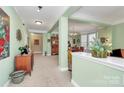 Open concept living area with a neutral color palette and hardwood floors at 3229 Sapphire Ln, Fort Mill, SC 29708