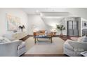 Bright living room featuring modern furnishings, hardwood floors, and neutral color palette at 287 Mcdonald Ave, Charlotte, NC 28203