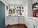 Bright kitchen showcasing white cabinetry, modern countertops, and a view of the outdoors at 331 E White St, Rock Hill, SC 29730