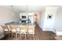 Modern kitchen with granite countertops and stainless steel appliances at 1010 10Th Ne Ave, Hickory, NC 28601