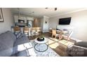 Open living space with dining area and hardwood floors at 1010 10Th Ne Ave, Hickory, NC 28601