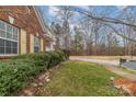 Lush landscaping frames this home, enhancing its curb appeal and providing a sense of privacy at 3302 Cole Mill Rd, Charlotte, NC 28270