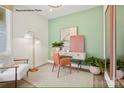 Bright home office with a desk, chair, and leafy plants at 1616 Shoals Ave # 152, Belmont, NC 28012