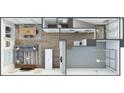 Open floor plan with kitchen, living area, and garage at 2005 Endeavor Run, Charlotte, NC 28269