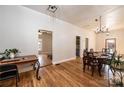 Dining room with a chandelier, hardwood flooring, and a view to the outside at 909 1St S Ave, Conover, NC 28613
