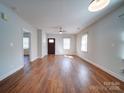 Spacious living room with hardwood floors and plenty of natural light at 1213 Cloninger Ave, Gastonia, NC 28052