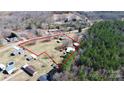 Aerial view showing the property lines, house, and surrounding wooded areas at 1354 Mirror Lake Rd, Lincolnton, NC 28092