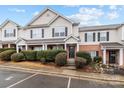 Charming townhouse featuring neutral siding, black shutters, well-maintained landscaping, and a welcoming entrance at 3553 Calpella Ct, Charlotte, NC 28262
