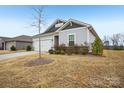 Inviting home with a manicured lawn, showcasing its attractive architecture and curb appeal at 4919 Trigney Ct, Charlotte, NC 28214