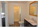 Bathroom featuring a shower with white tile and modern fixtures at 529 Gage St, Chester, SC 29706