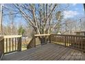 A spacious wooden deck offers a tranquil outdoor living space with views of the yard at 544 Baltimore Dr, Cramerton, NC 28032