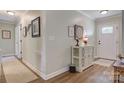 Bright entryway with hardwood floors and neutral-toned walls at 8321 Old Nc 10 Hwy, Hickory, NC 28602