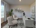 Well-lit home office with modern desk, comfortable seating, stylish decor, and a calm, productive atmosphere at 143 Aberdeen Dr, Salisbury, NC 28144